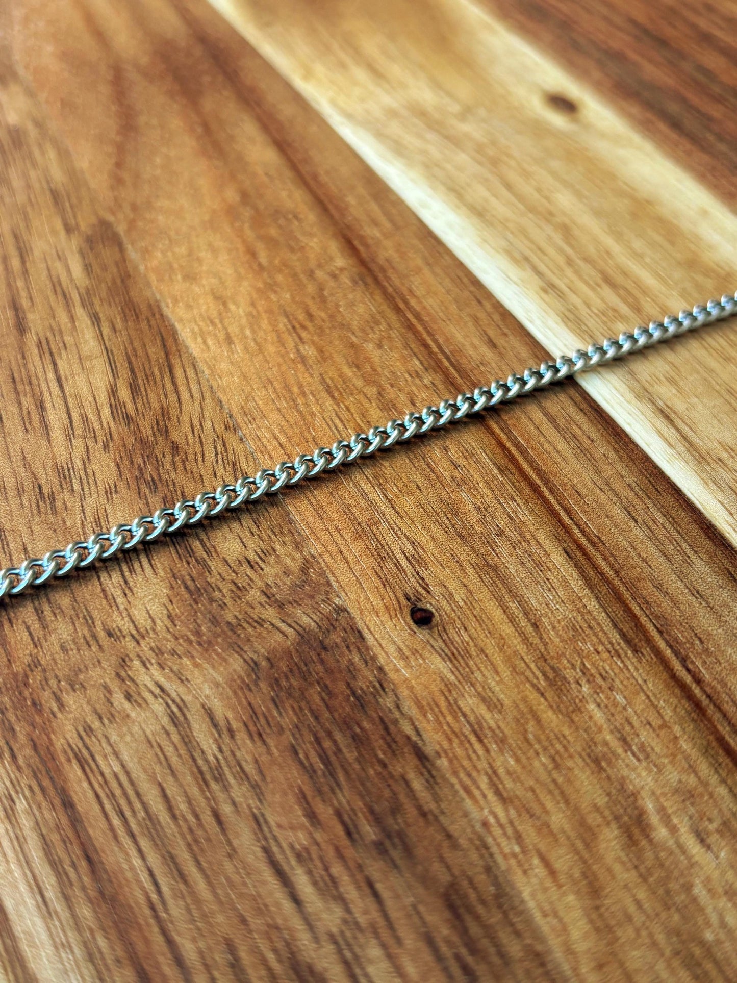 4mm x 3mm slightly twisted oval links Stainless Steel Curb Chain sold by the Foot