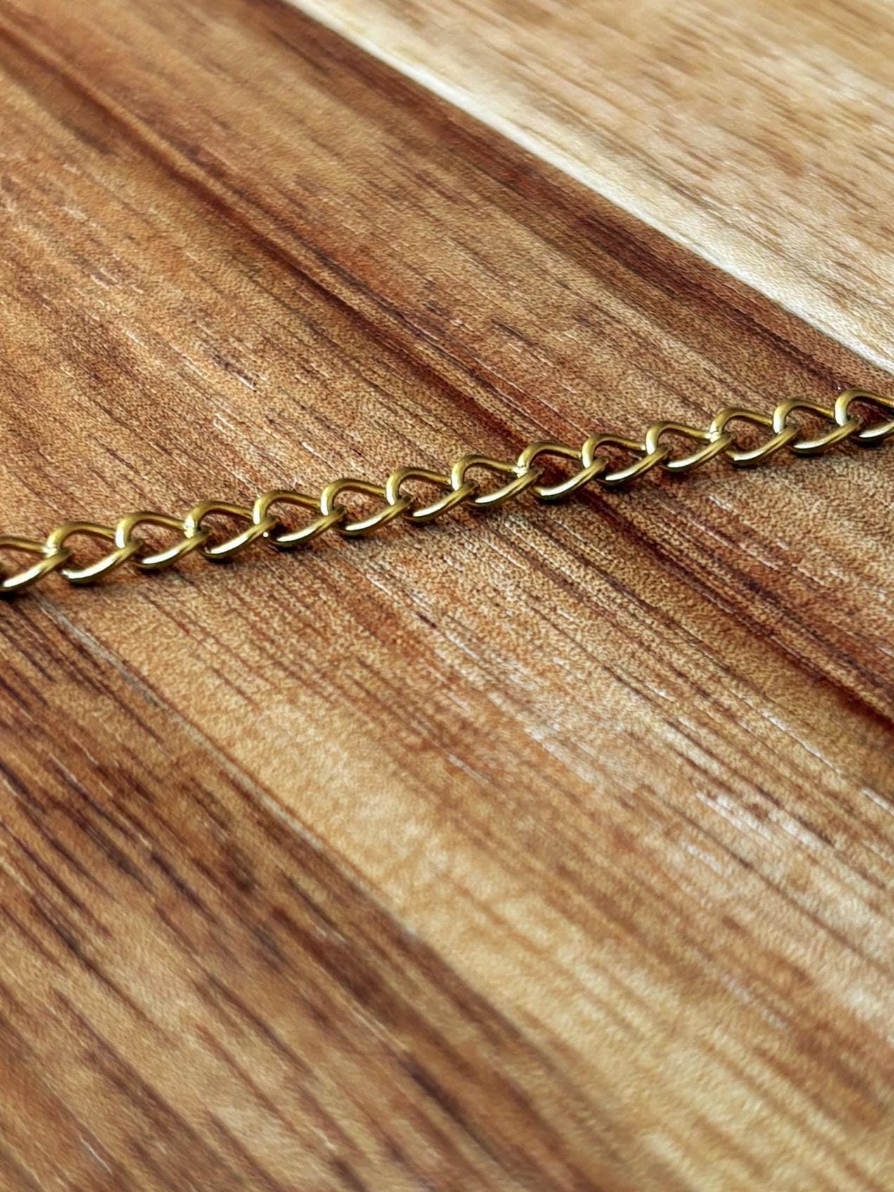 Curb chain size small 3 mm x 4 mm waterproof gold stainless steel sold by the foot