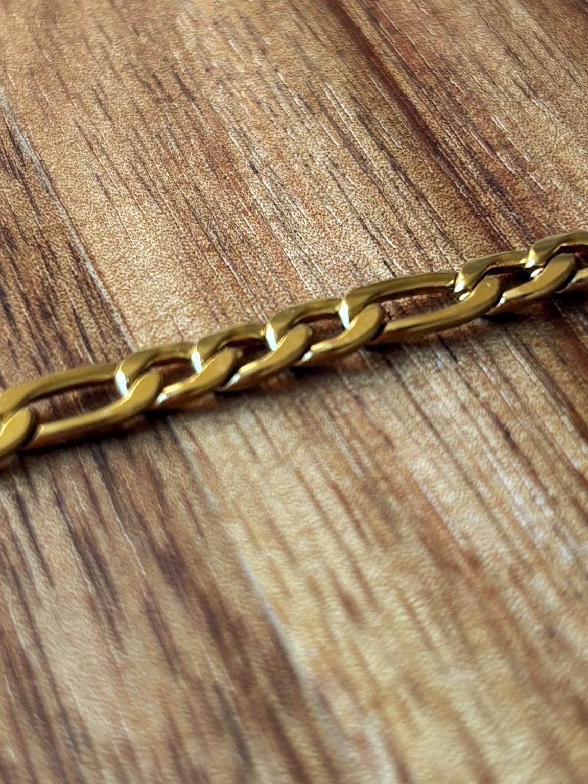 Waterproof Gold Figaro Chain by the Foot – 316 Stainless Steel 4.5mm x 7.1mm